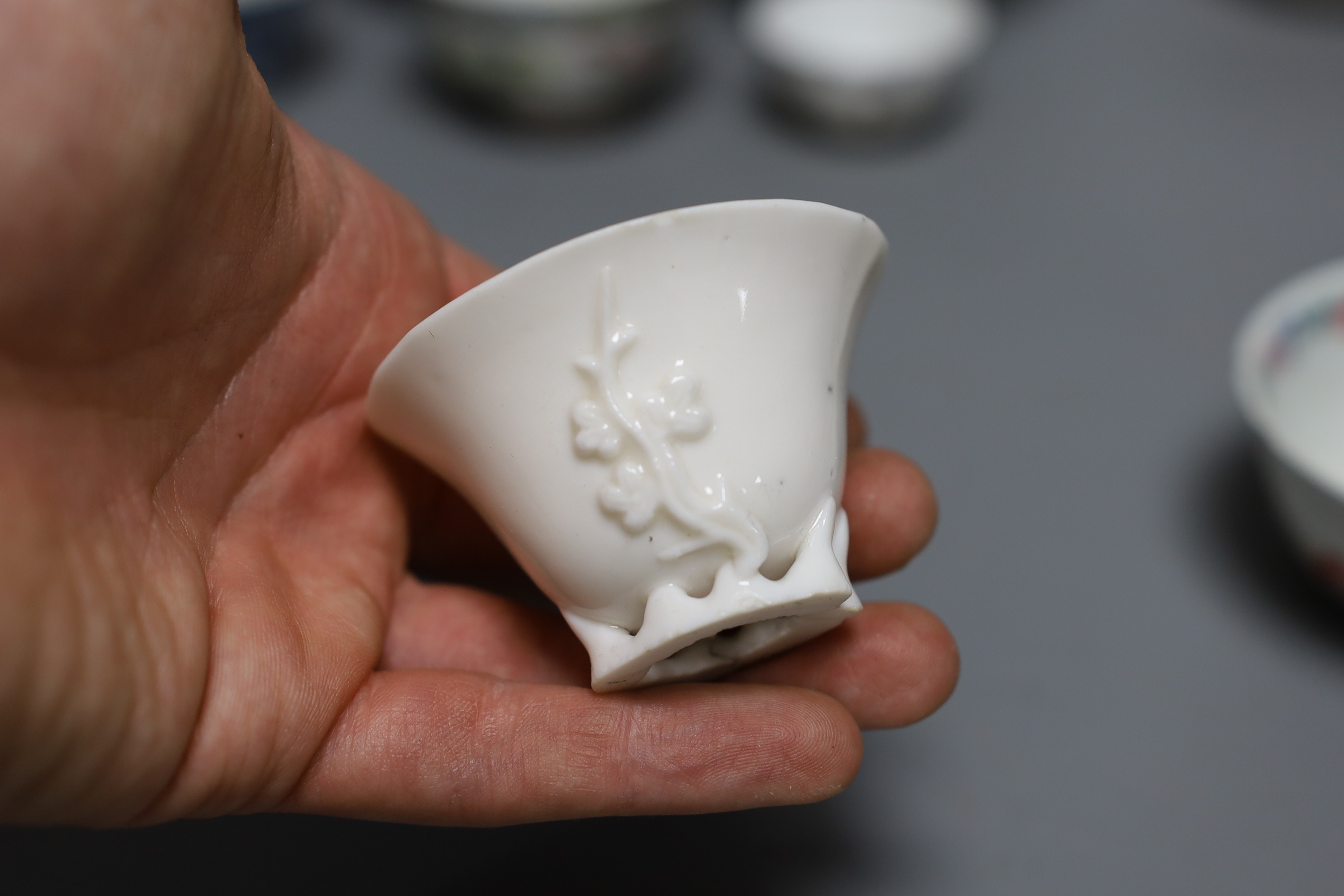A Chinese Dehua libation cup, eight 18th century and later Chinese porcelain tea bowls and a Kutani tea bowl